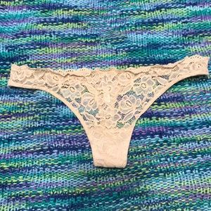 Nude lace thong